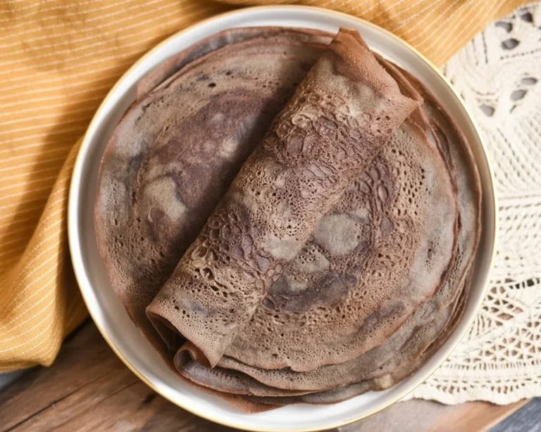 Delicious Teff Injera Flatbread served with traditional Ethiopian dishes.