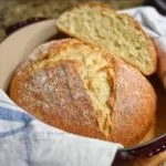 Baking easy gluten free artisan bread with a crispy crust and soft inside.