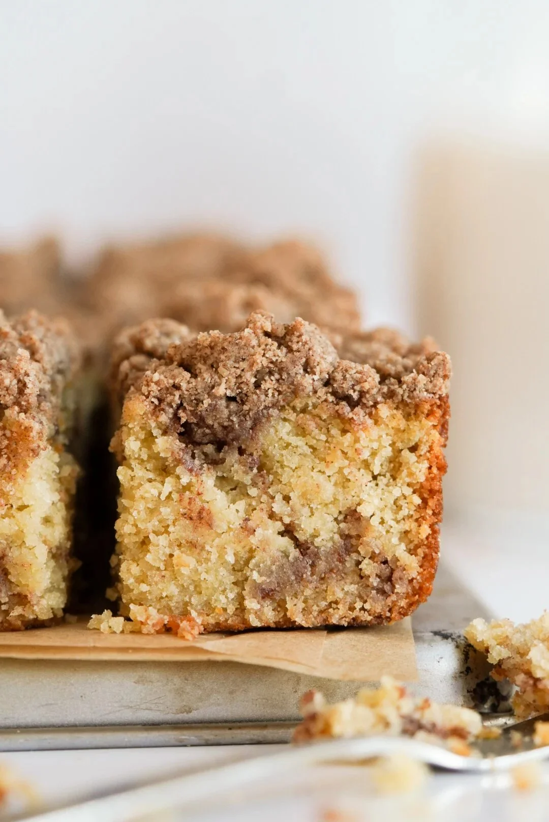 Gluten-free cinnamon coffee cake topped with cinnamon streusel.